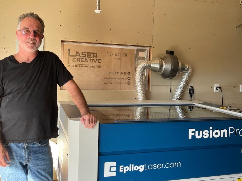 Rick Wallen with his Epilog Laser Fusion Pro Machine in his LaserCreative, LLC workshop